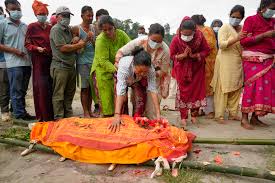 Families perform symbolic funeral for thousands still missing in Nepal, as death toll surges to 1,259